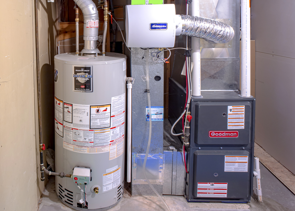 Ceiling water damage near A/C vent in a Chicago home caused by HVAC condensation.