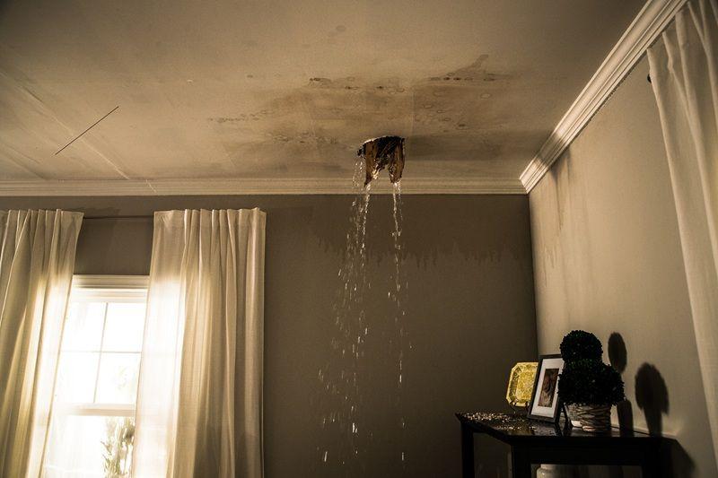 Small ceiling stain caused by hidden plumbing leak in a Chicago condo.