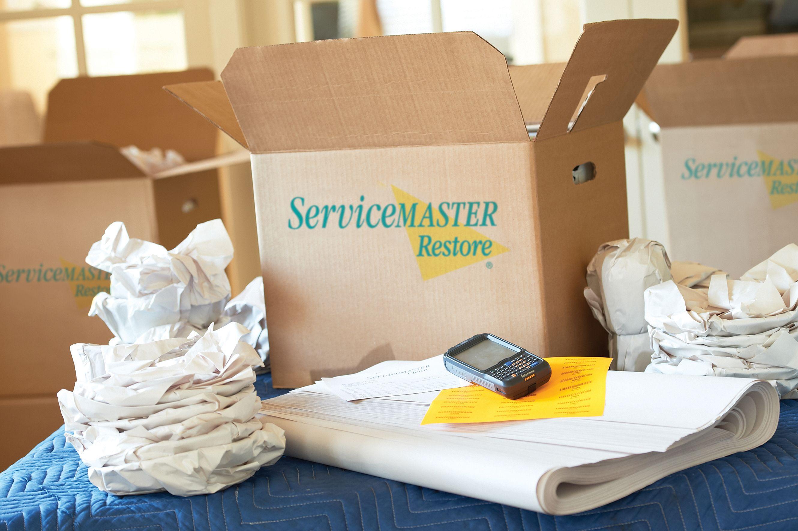 ServiceMaster Restoration By Simons providing content packout services for fire or water damage restoration